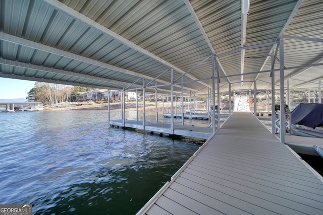 view of dock with a water view