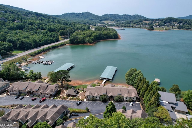 bird's eye view with a residential view and a water view