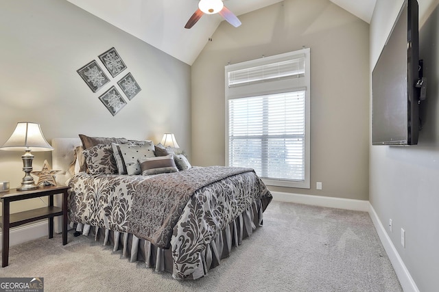 bedroom with baseboards, carpet floors, lofted ceiling, and ceiling fan