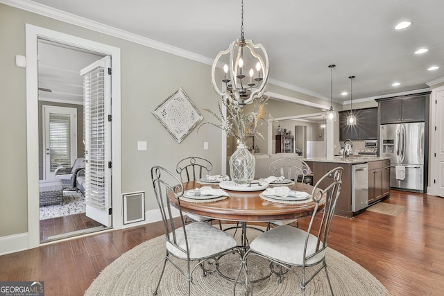 dining room with baseboards, recessed lighting, dark wood-style flooring, and ornamental molding