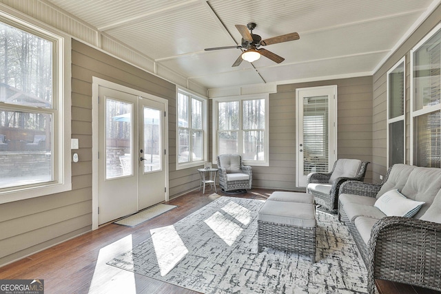 sunroom featuring french doors and ceiling fan