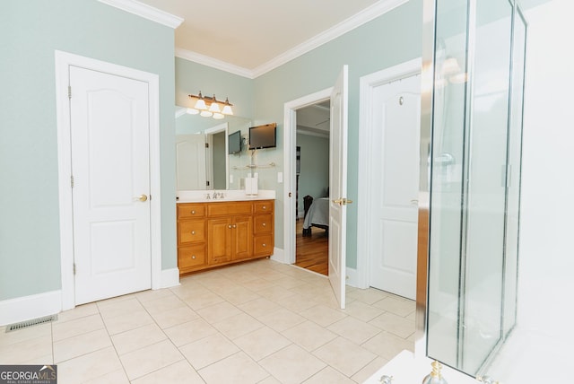 bathroom featuring vanity, a shower stall, visible vents, and ornamental molding
