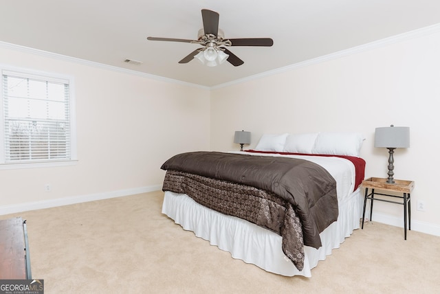 bedroom featuring carpet flooring, visible vents, baseboards, and ornamental molding