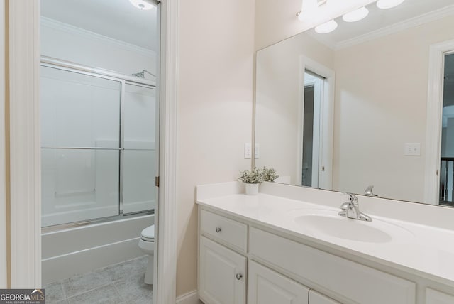 full bathroom featuring vanity, enclosed tub / shower combo, tile patterned flooring, crown molding, and toilet