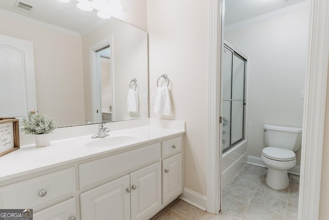 full bathroom with visible vents, toilet, vanity, and ornamental molding
