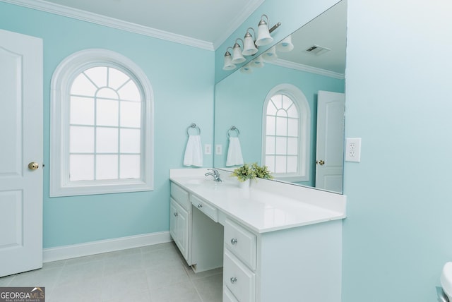 bathroom featuring visible vents, plenty of natural light, vanity, and crown molding