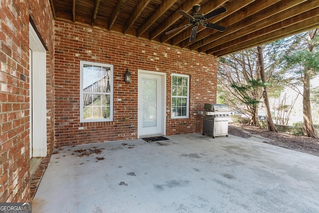 back of house with brick siding, stairway, a wooden deck, a chimney, and a yard