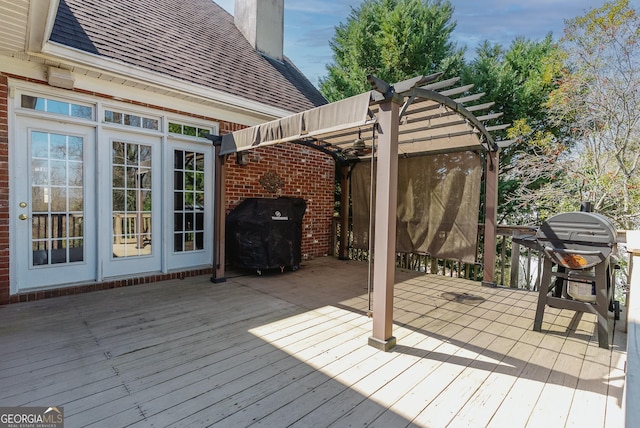 traditional-style home featuring driveway, brick siding, roof with shingles, and a front yard