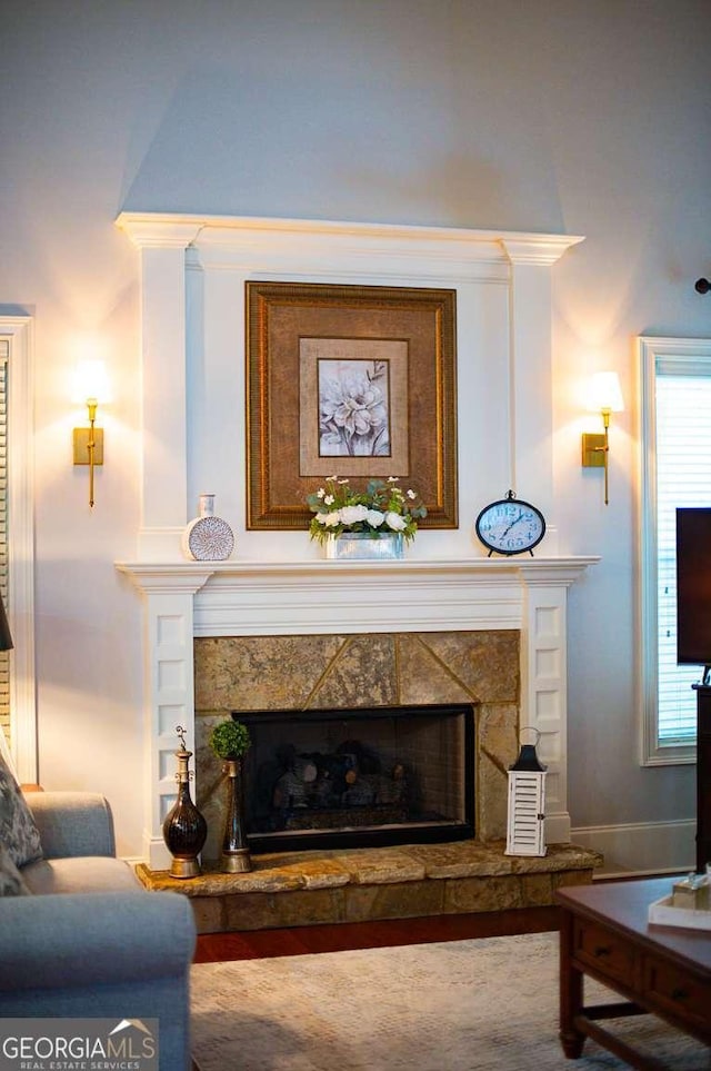 living room with a premium fireplace