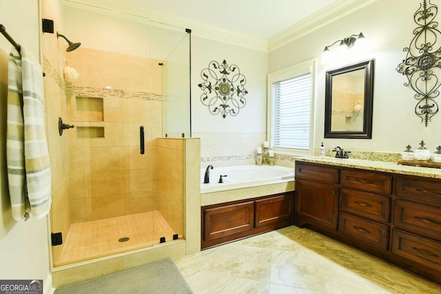 bathroom with vanity, a shower stall, a bath, and ornamental molding