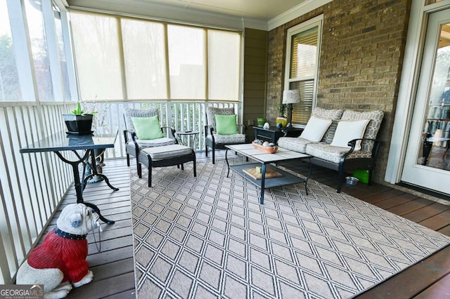 sunroom / solarium featuring a wealth of natural light