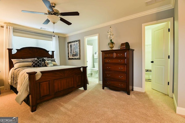 bedroom featuring baseboards, visible vents, ornamental molding, ensuite bathroom, and light carpet