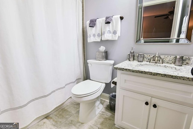 full bath featuring toilet and vanity