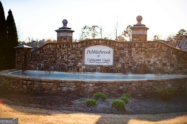 view of community sign