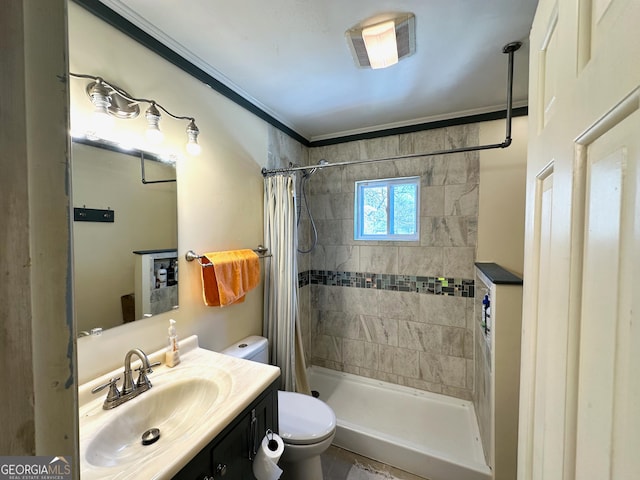 bathroom featuring vanity, a shower stall, toilet, and visible vents