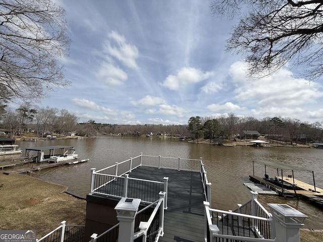 dock area with a water view