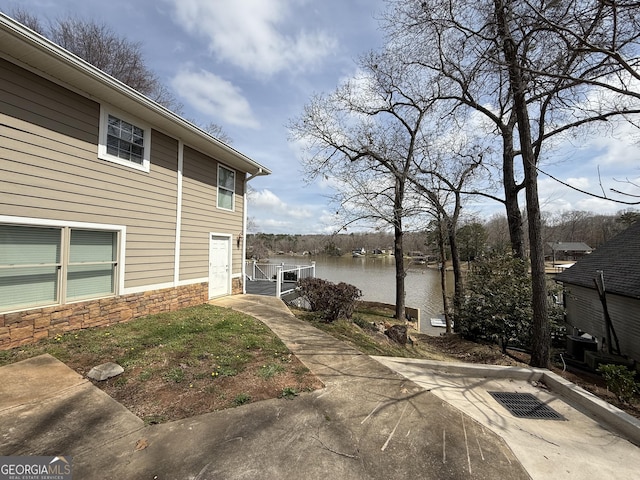 exterior space featuring a water view