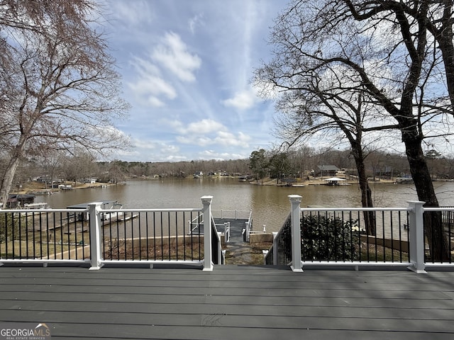 dock area with a water view