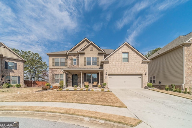 view of front of property with a garage, a porch, concrete driveway, and fence