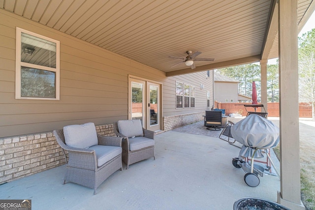 view of patio / terrace with french doors and ceiling fan