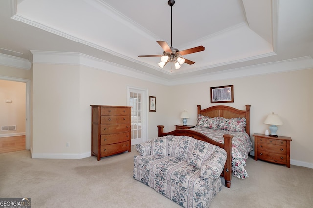 bedroom with crown molding, carpet, visible vents, and baseboards