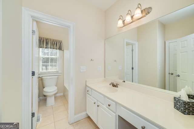 bathroom with visible vents, toilet, tile patterned flooring, baseboards, and vanity