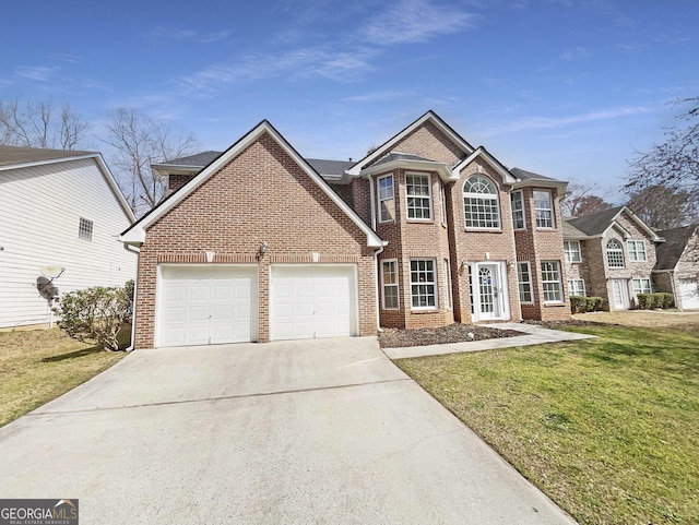 view of front of home featuring a garage, brick siding, concrete driveway, and a front yard