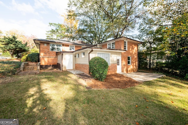 view of front of house with brick siding, a front lawn, and a patio area