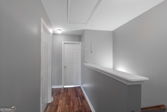 1383 Dolcetto Trce NW Unit 9, Kennesaw, GA 30152 - hallway with dark wood-style flooring and attic access