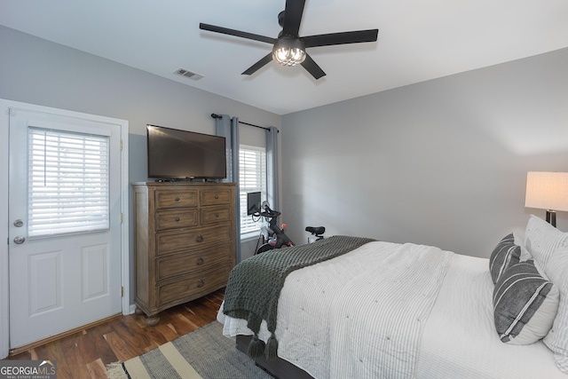 1383 Dolcetto Trce NW Unit 9, Kennesaw, GA 30152 - bedroom featuring wood finished floors and ceiling fan