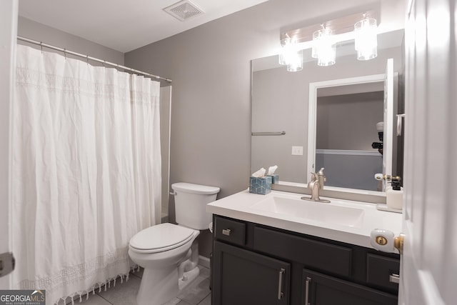 bathroom with vanity, a shower with shower curtain, toilet, and visible vents