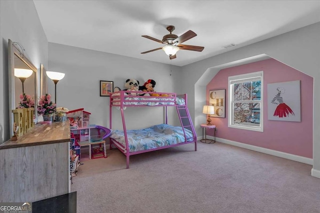 bedroom with visible vents, baseboards, ceiling fan, and carpet flooring