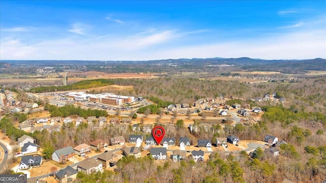 bird's eye view with a mountain view