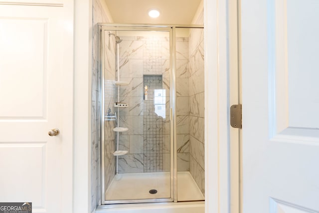 bathroom featuring a stall shower