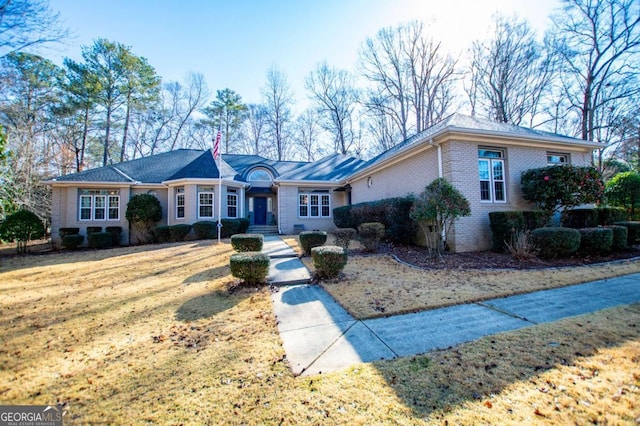 ranch-style home with brick siding