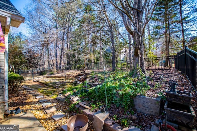 view of yard with a fenced backyard