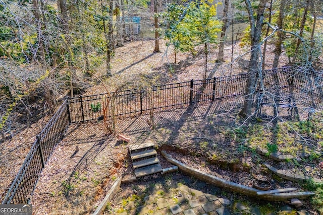 view of yard with a fenced backyard