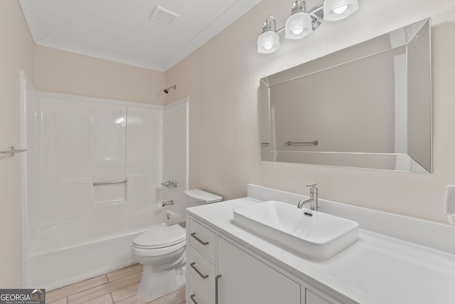 full bathroom featuring visible vents, toilet, ornamental molding, shower / tub combination, and vanity