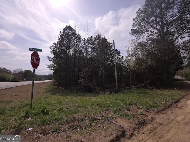 view of road with traffic signs