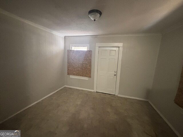 80 Harlan Rd SW, Atlanta, GA 30311 - unfurnished dining area featuring ornamental molding and baseboards