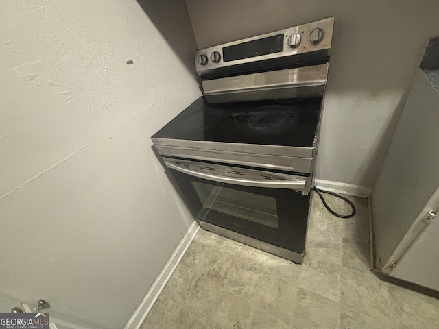 80 Harlan Rd SW, Atlanta, GA 30311 - kitchen view of stainless steel electric stove and oven