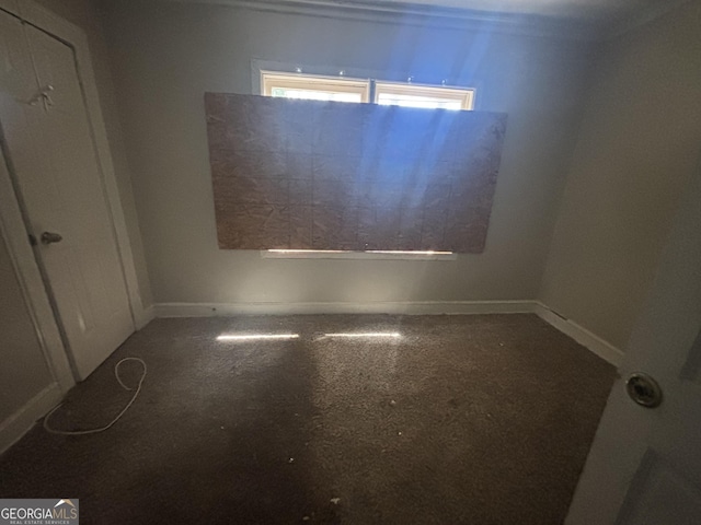 80 Harlan Rd SW, Atlanta, GA 30311 - spare room featuring baseboards and carpet flooring