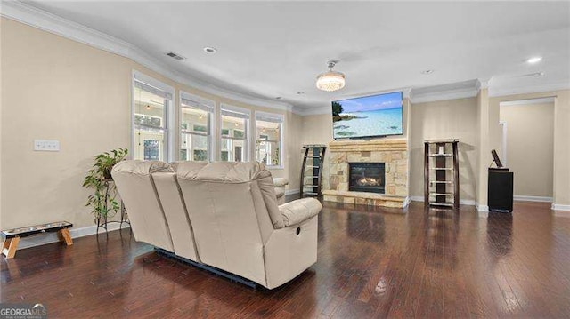 living room featuring visible vents, crown molding, and wood finished floors