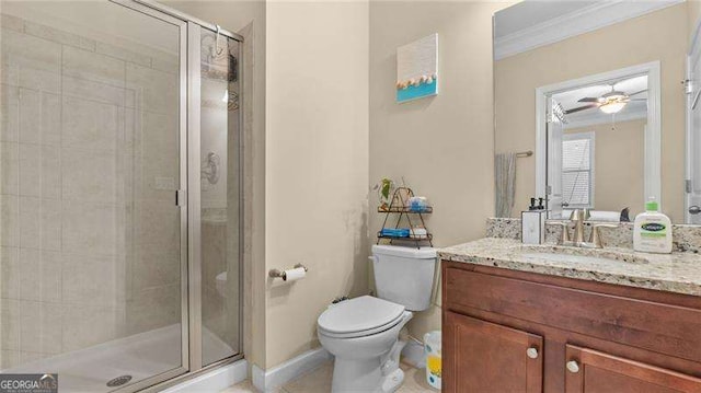 full bathroom featuring toilet, a stall shower, vanity, and ornamental molding