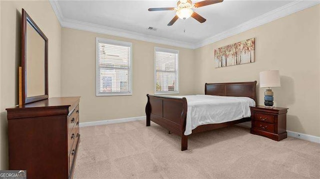 bedroom featuring baseboards, light colored carpet, ornamental molding, and a ceiling fan