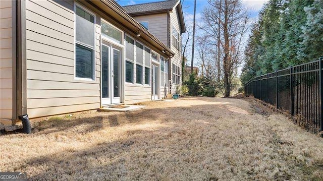 view of yard featuring fence