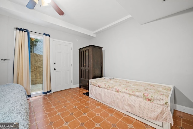 bedroom featuring access to exterior, a ceiling fan, and baseboards