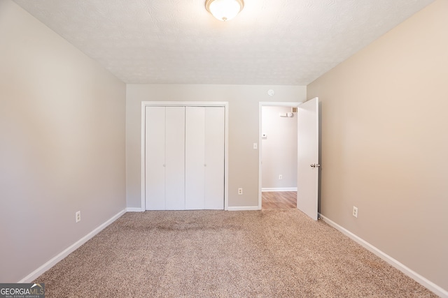 6265 Stoney Cv, Austell, GA 30168 - unfurnished bedroom featuring carpet flooring and a closet