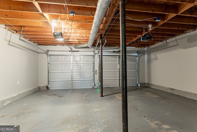 6265 Stoney Cv, Austell, GA 30168 - garage featuring a garage door opener