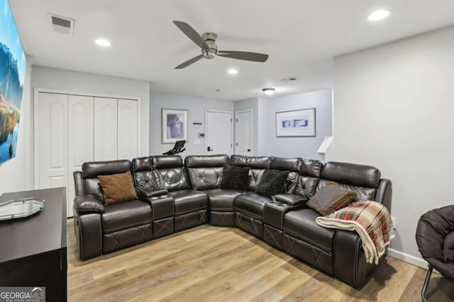 living area featuring recessed lighting, light wood-style flooring, visible vents, and ceiling fan